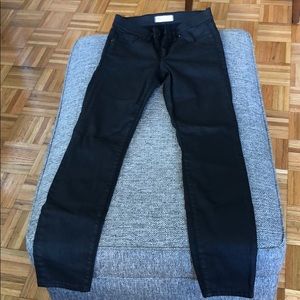 High rise black with sheen skinny jeans.